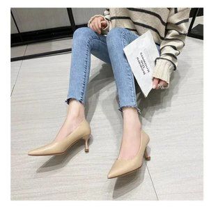 Black professional pointed heels for women with a thin heel and a soft skin